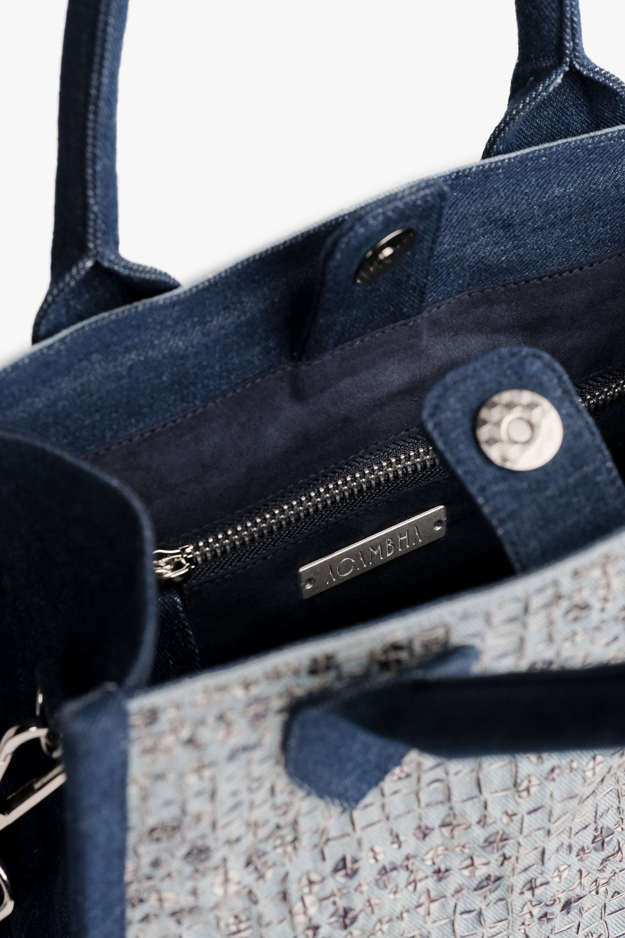 Acambha Handmade Tote Bag with multi-color embroidery on dark denim. Handcrafted with care, combining fashion with functionality in a spacious, durable design